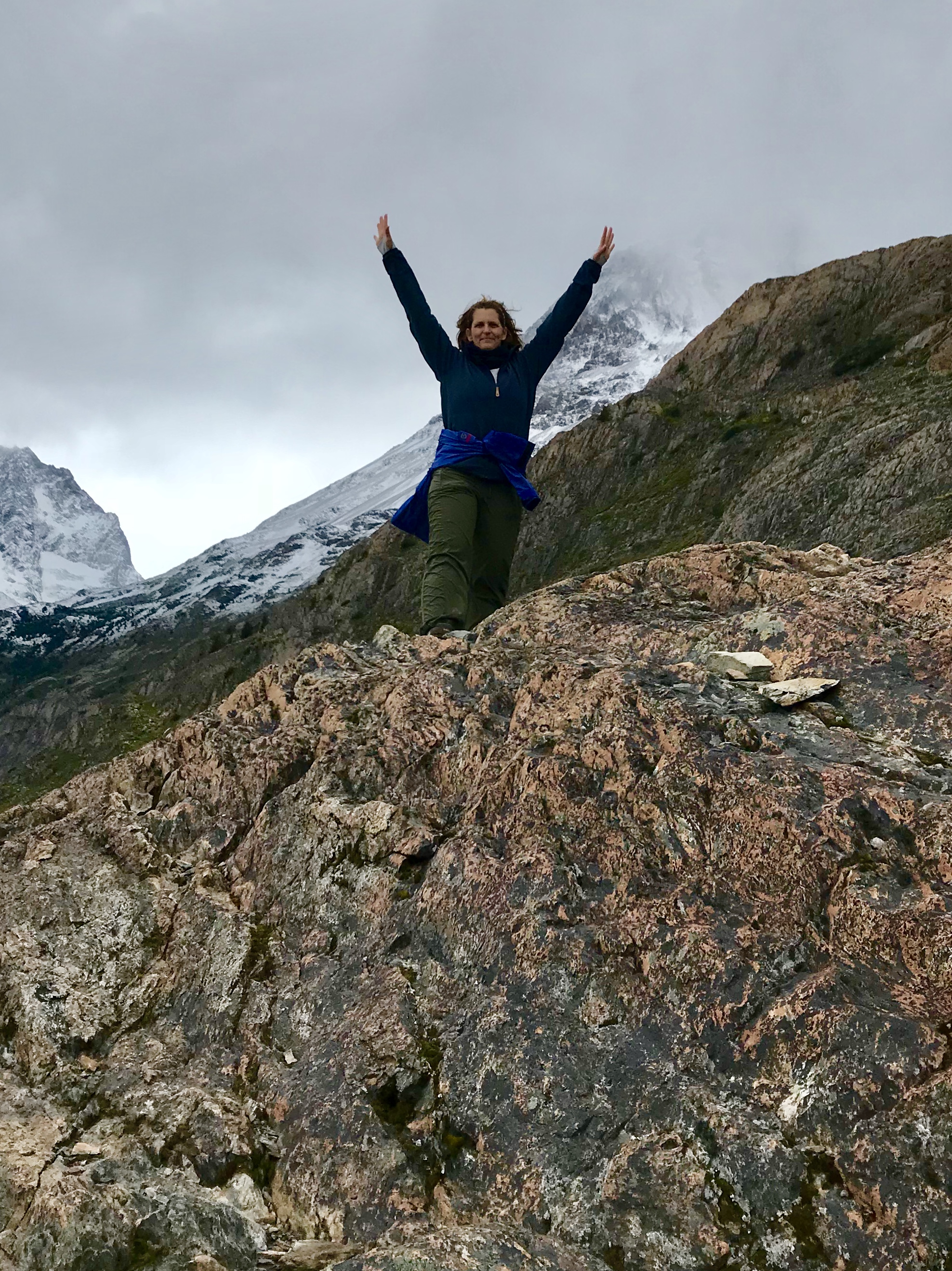 climbing to the top of the mountain in Patagonia